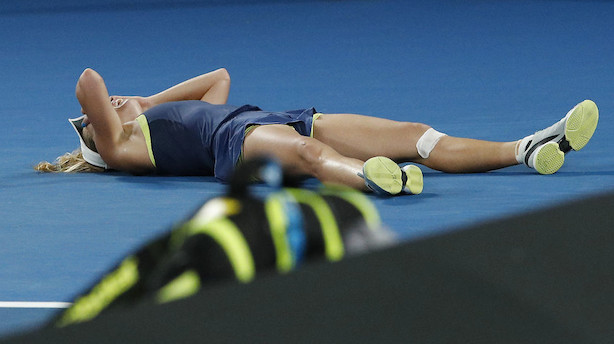 Formidable Wozniacki vinder første grand slam-titel