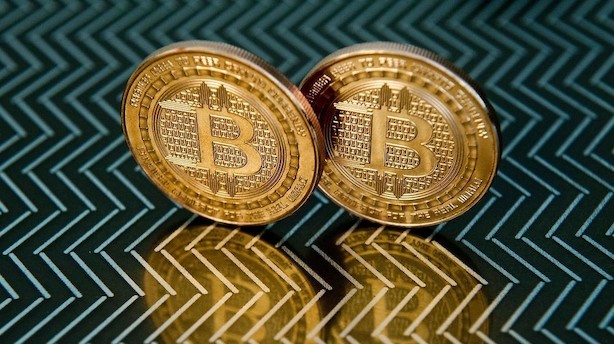 Bitcoin i ny rekord: Banker gennem 18.000 dollar